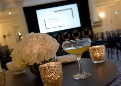 Fay-Campbell-Events--FairmontLovesFilmatTheSavoy-Cocktails-with-the-screen-in-the-background