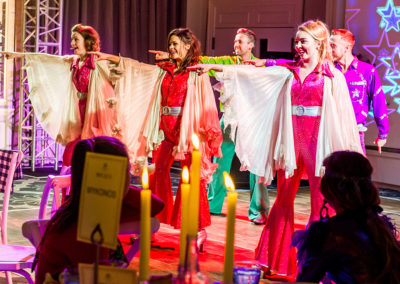 Fay-Campbell-Events-dancers-in-bright-outfits-like-abba