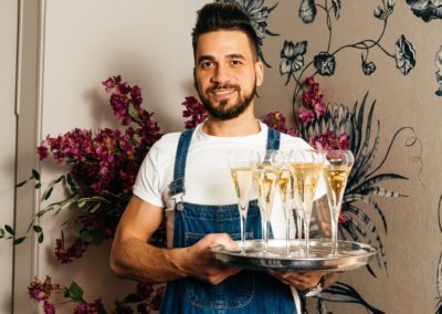 Fay-Campbell-Events-waiter-in-dungaress-beard-and-quiff