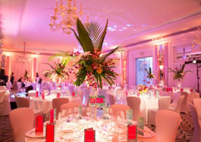 Fay Campbell Events CARIBTOURS 2017 brightly lit dining room with spectacular flower arrangements